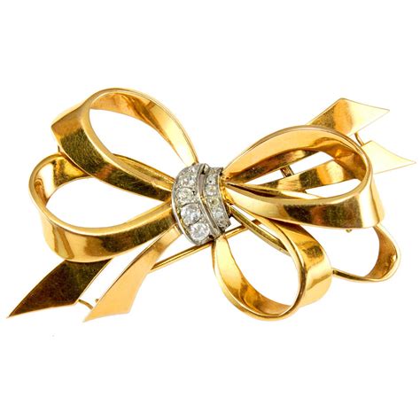 cartier bow|cartier brooches.